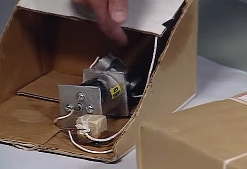Demonstration rig of box-flap-activated trigger