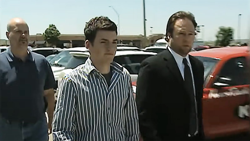 Chris Edwards walking with attorney